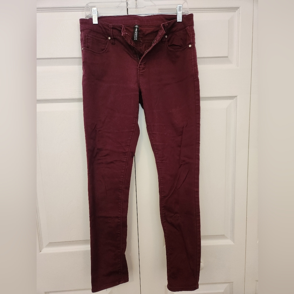 Size 27 Design Lab red wine colored skinny jeans.